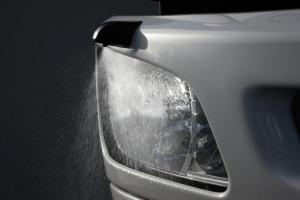 HID headlamps with auto-leveling and washer